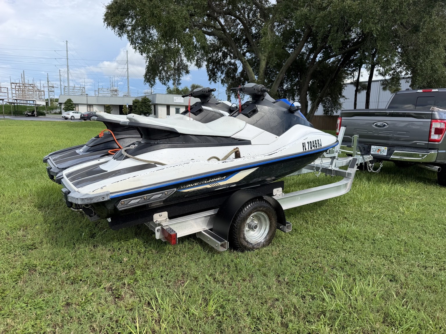 Commercial heavy-duty double jet ski trailer for lessons and rentals · loaded rear view