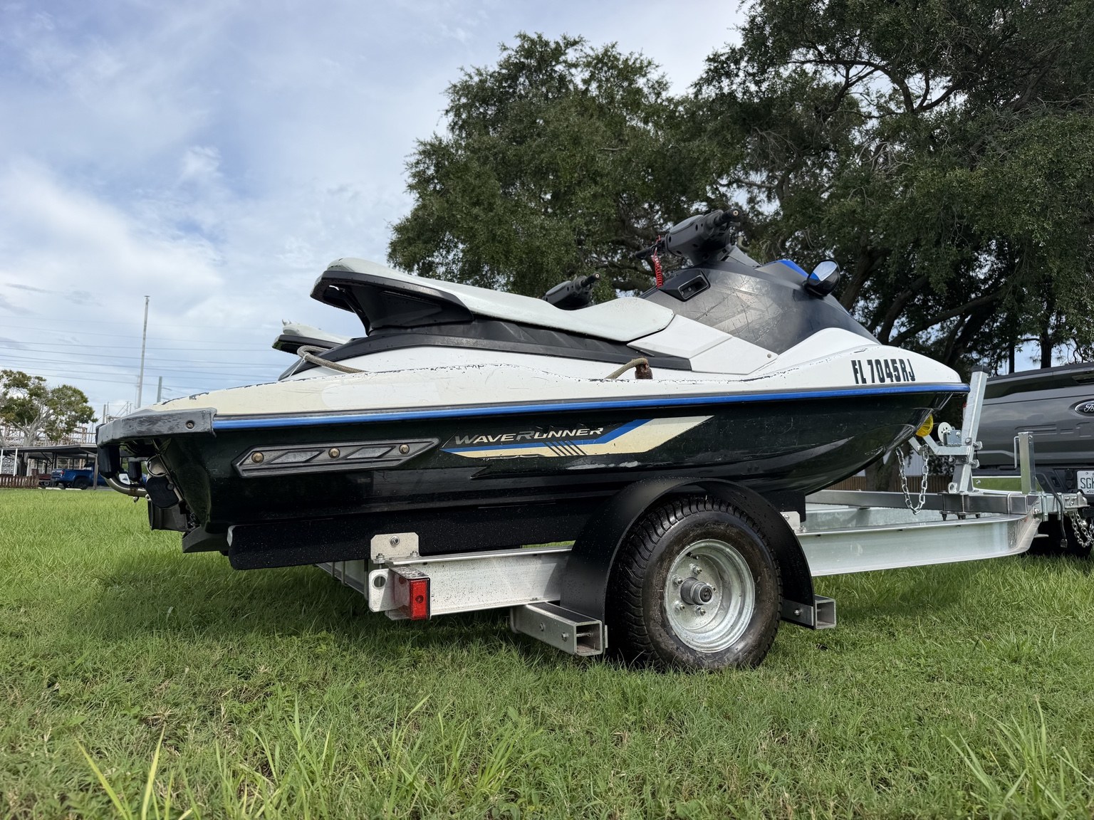 Commercial heavy-duty double jet ski trailer for lessons and rentals · loaded side and rear view