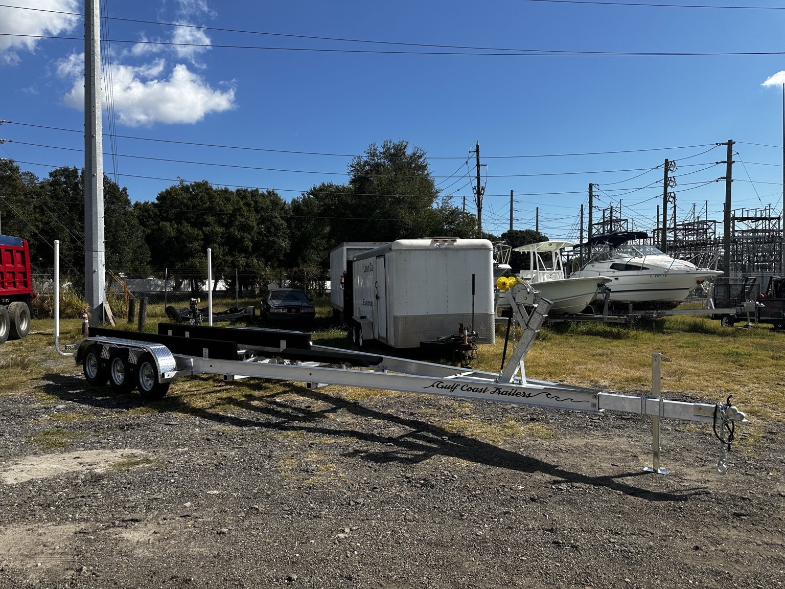 Front side view of a 10.5K triple-axle trailer