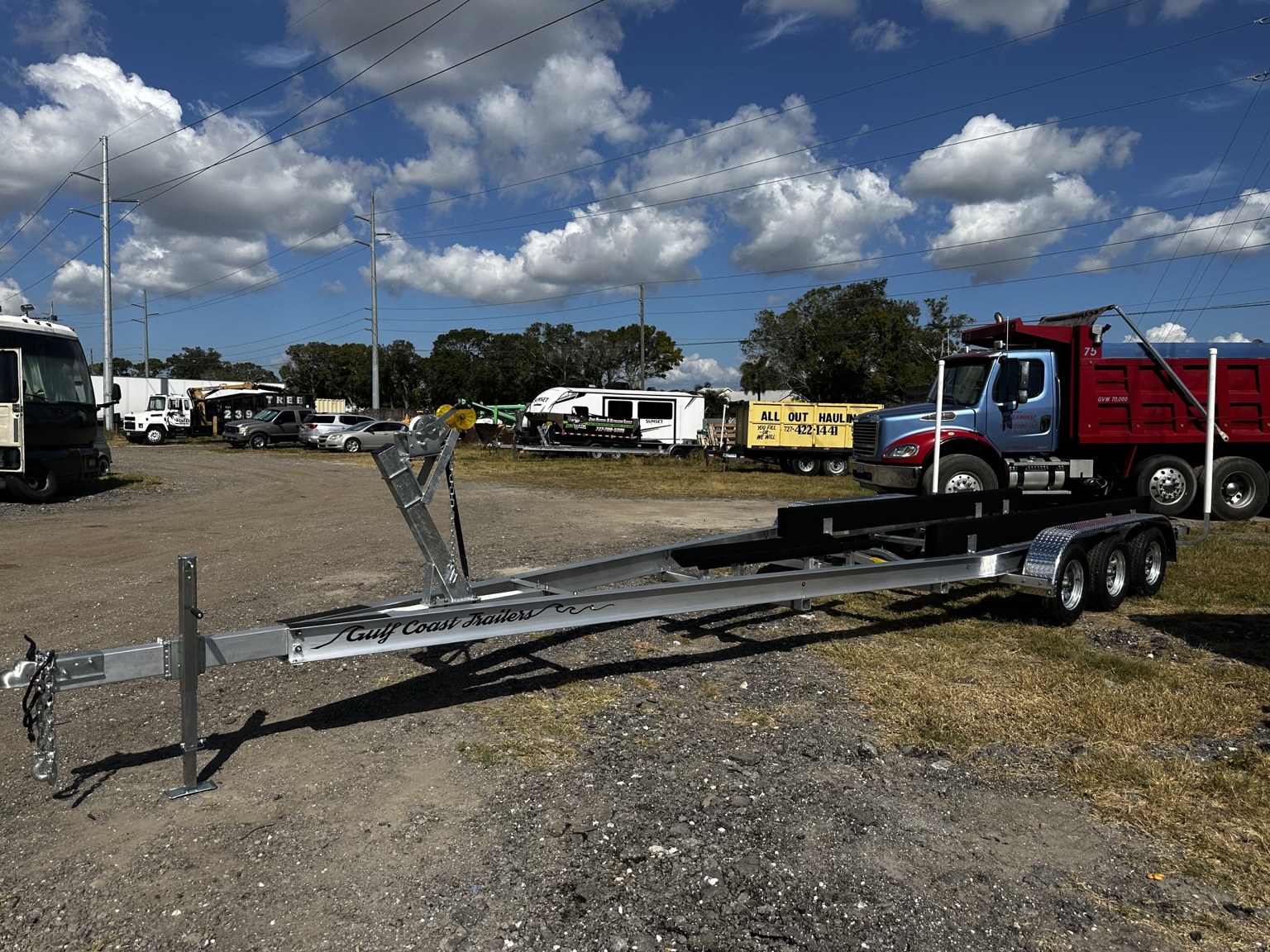 Opposite front side view of a 10.5K triple-axle trailer