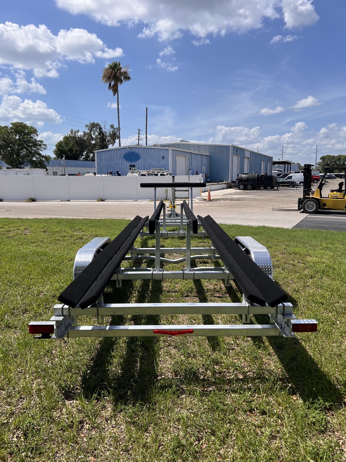 Rear bunk alignment view of a Gulf Coast Trailers 7K–12K Dual Catamaran build
