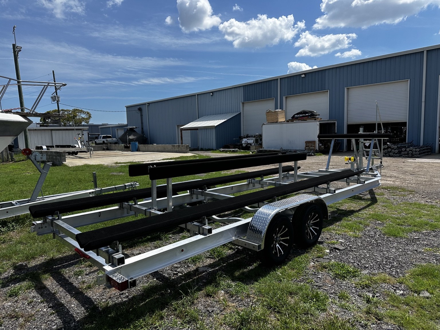 Rear three-quarter view of a Gulf Coast Trailers 7K–12K Dual Catamaran build