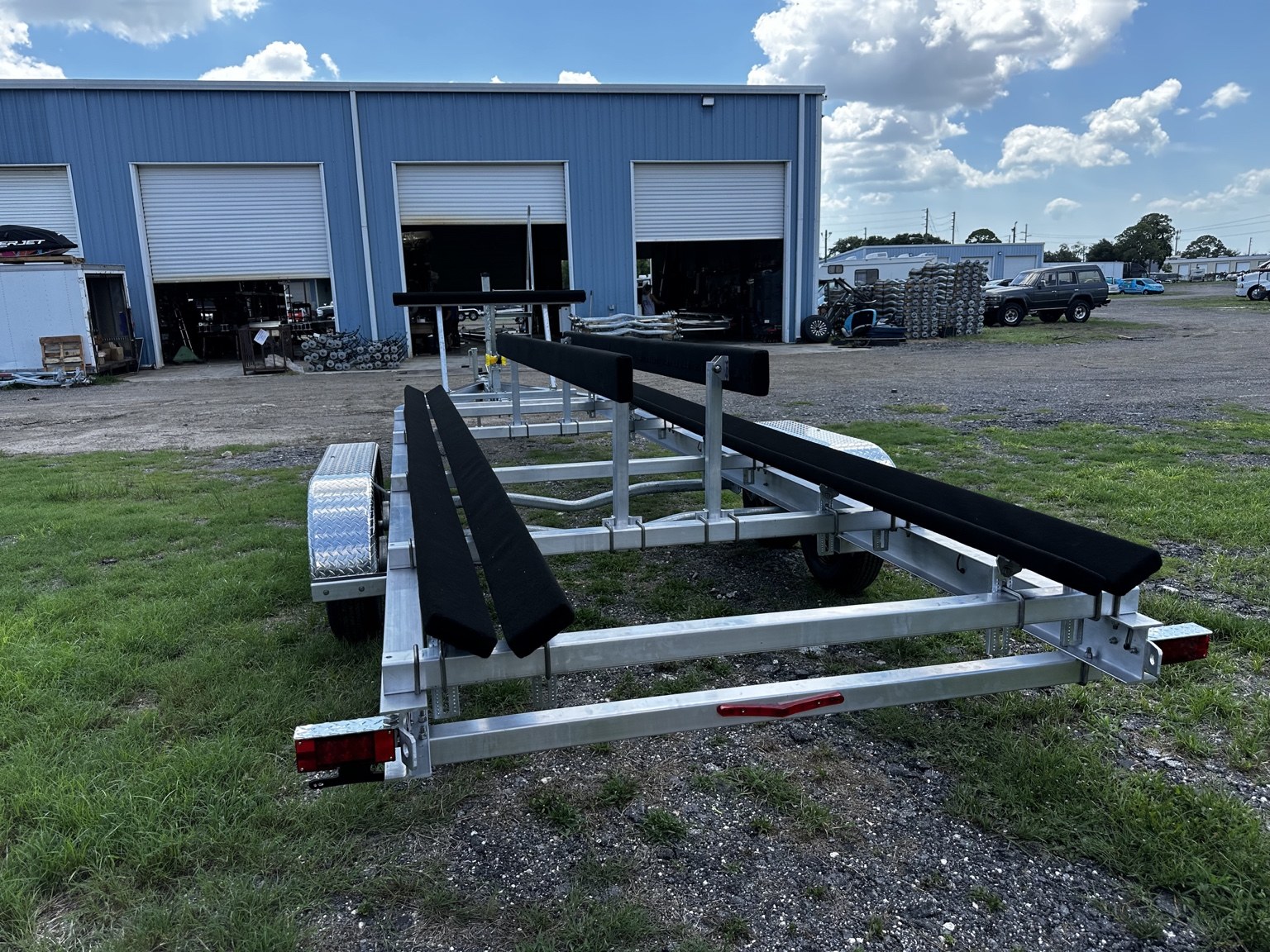 Rear hull-support view of a Gulf Coast Trailers 7K–12K Dual Catamaran build