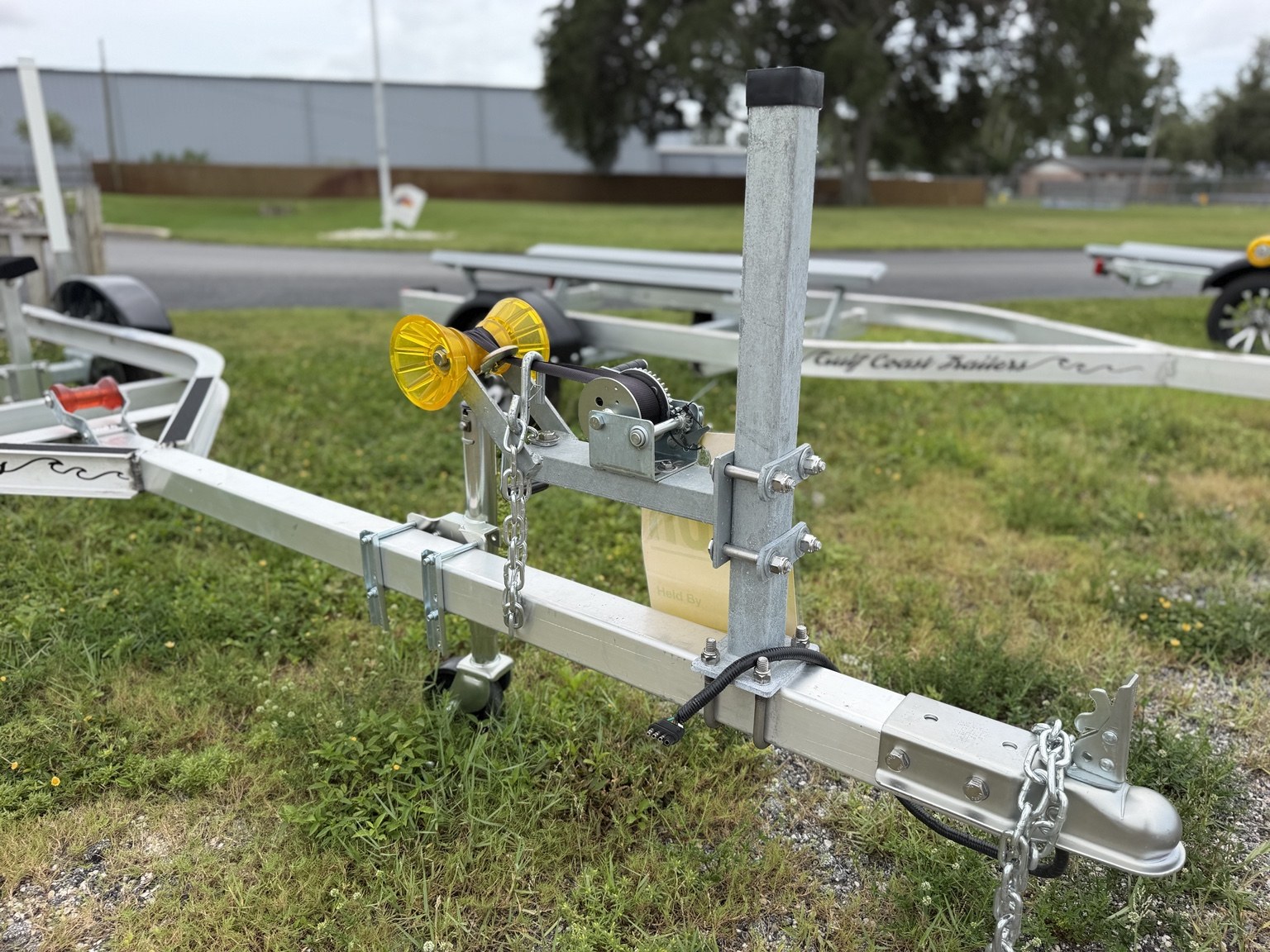 Extended-tongue jet ski trailer · Coupler and winch