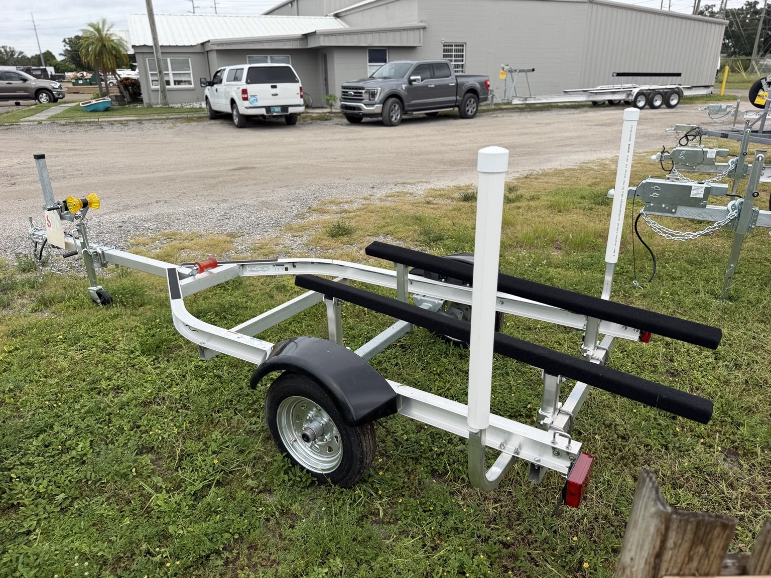 Extended-tongue jet ski trailer · Rear three-quarter view