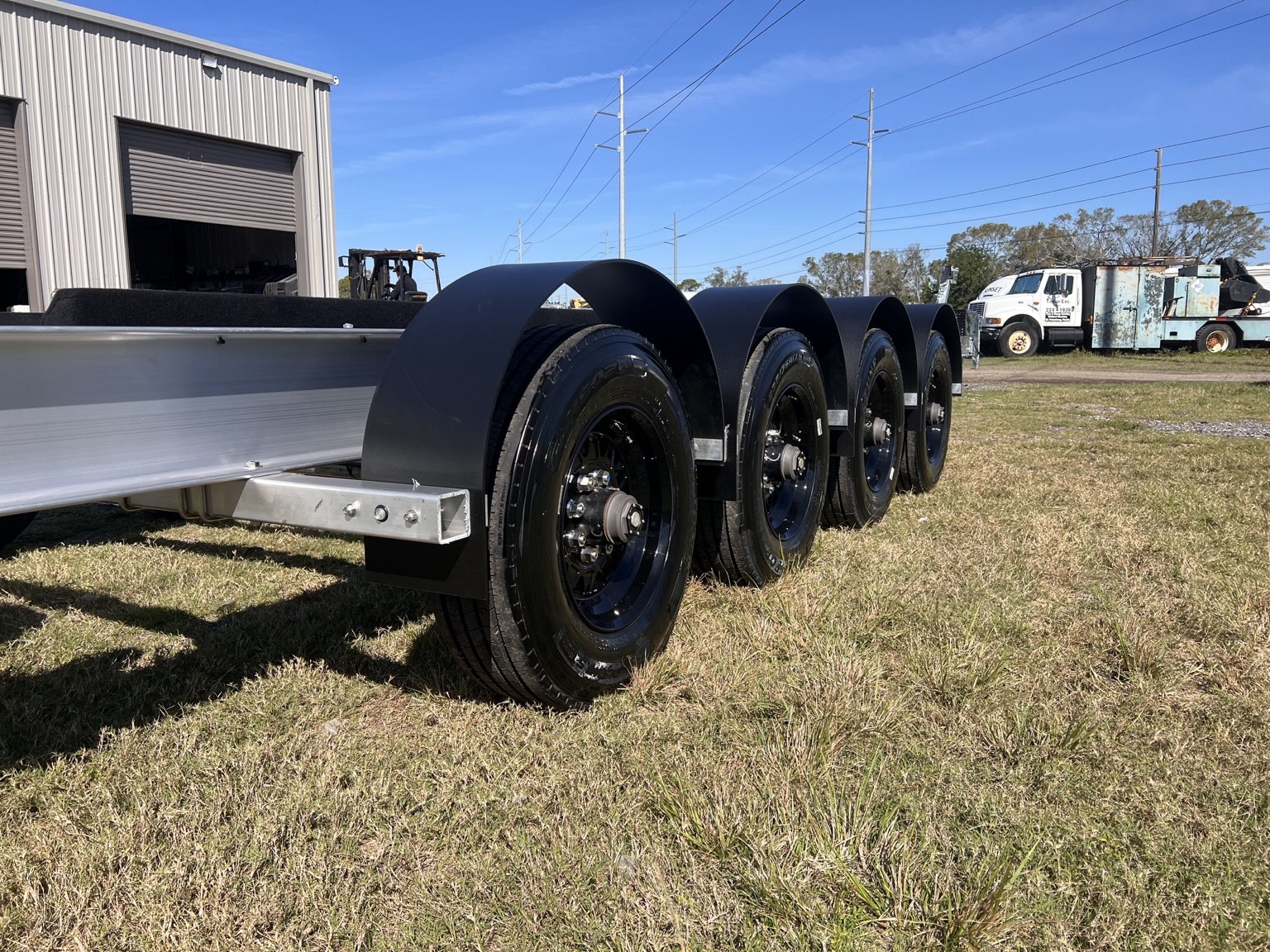 40K Quad-Axle Transporter · Opposite wheel view