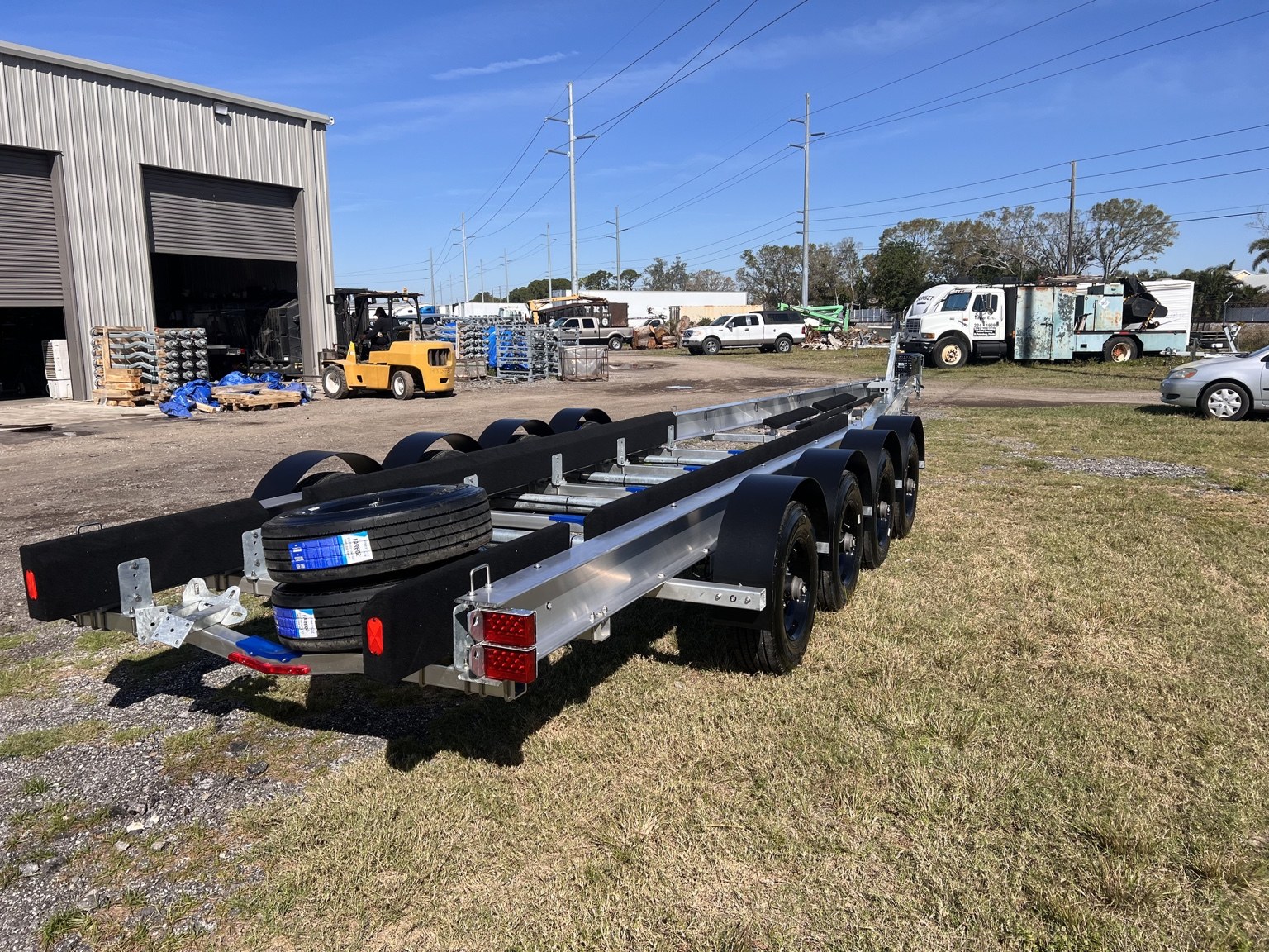 40K Quad-Axle Transporter · Rear three-quarter view